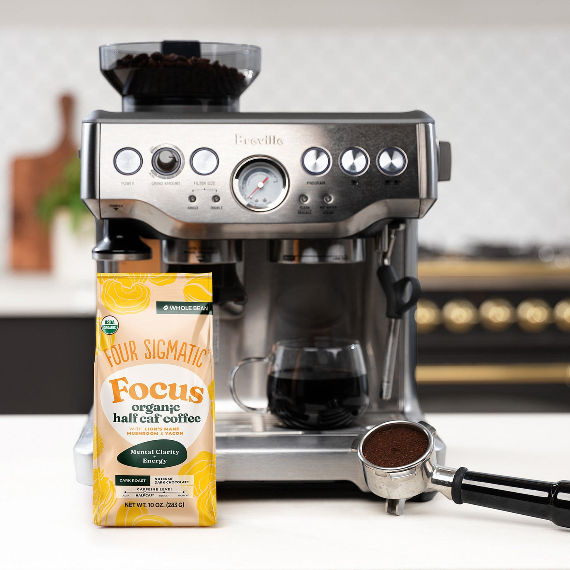 focus-half-caf-whole-bean-coffee-r0 Focus_Org_Dark_Roast_High_Caf_Kitchen_Pour_Woman_4_47b71a0c-c7fc-40fd-a2bc-fa7389dfb410.jpg